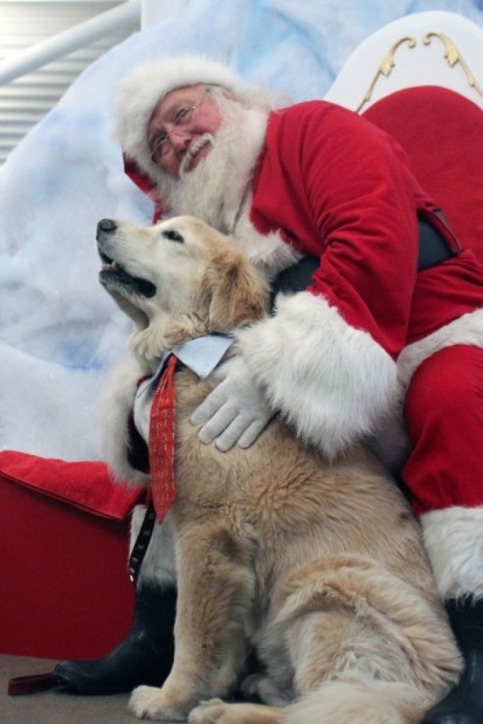 Santa has tails wagging at Welcome Center